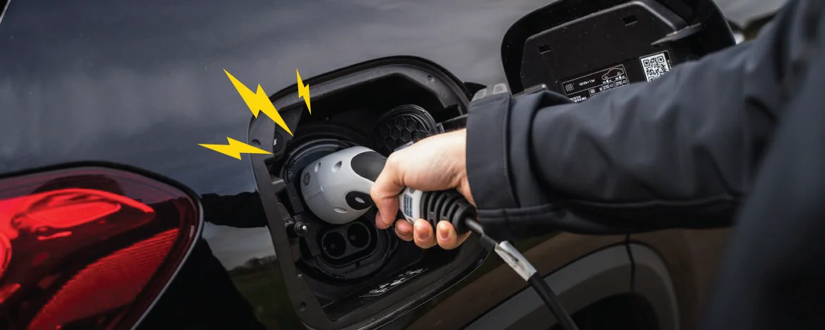 Man charging the Mercedes-Benz EQA