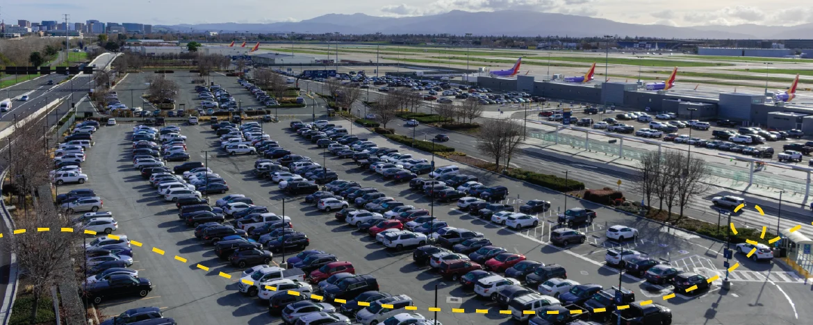 Airport parking lot overlooking airfield