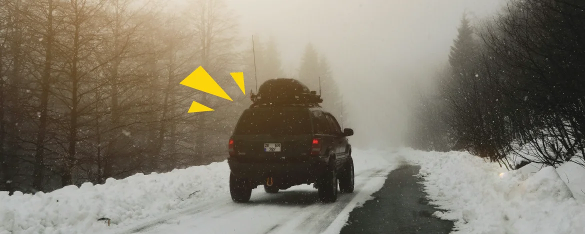 Car driving in snow
