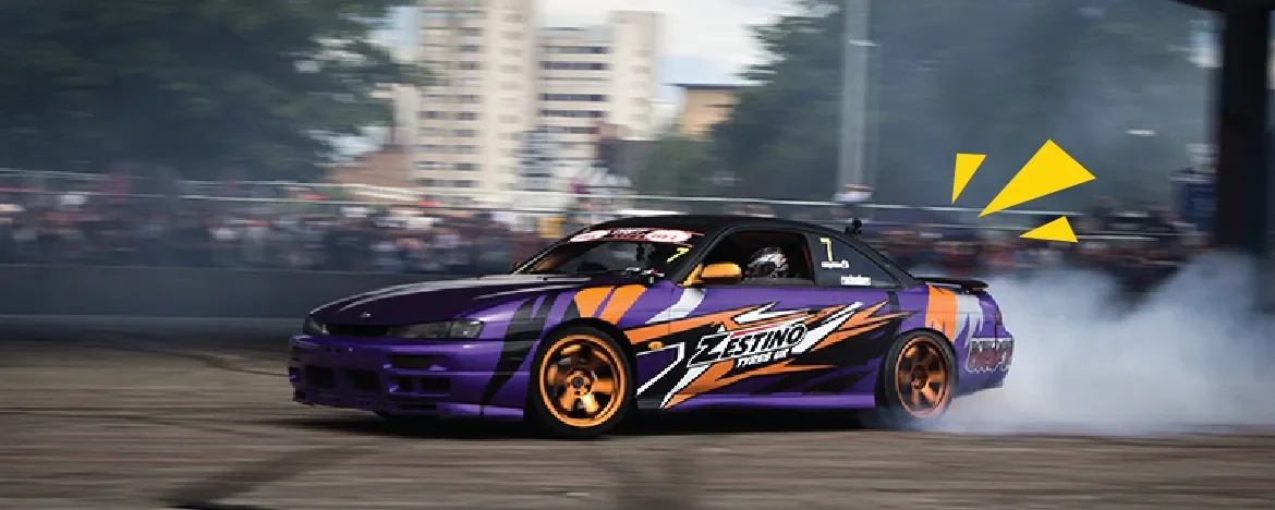 race car with smoke
