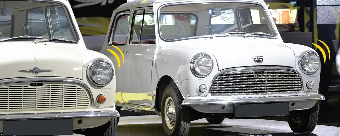 Two classic Mini's in white with image accents