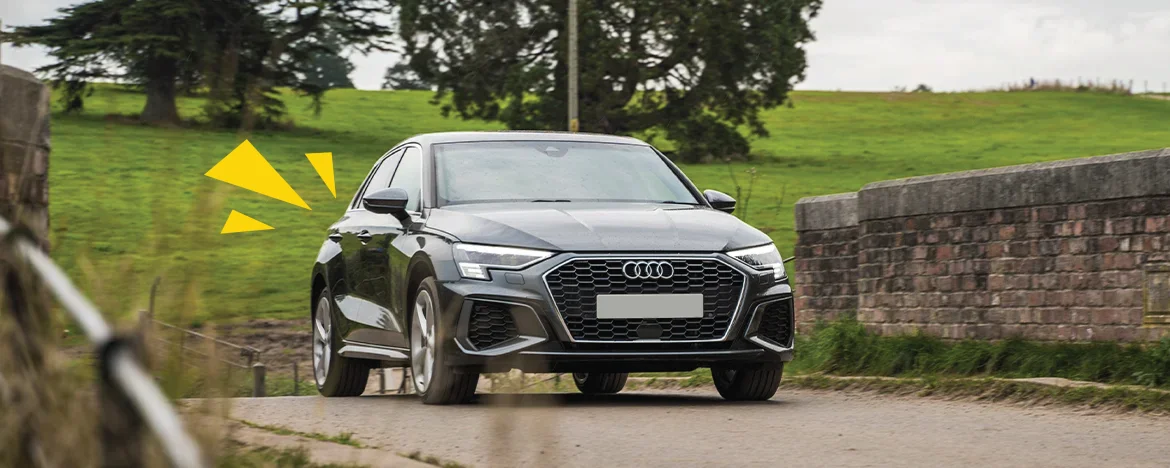 Audi A3 driving over bridge