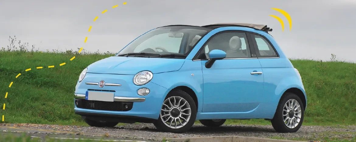 Fiat 500C parked in country 