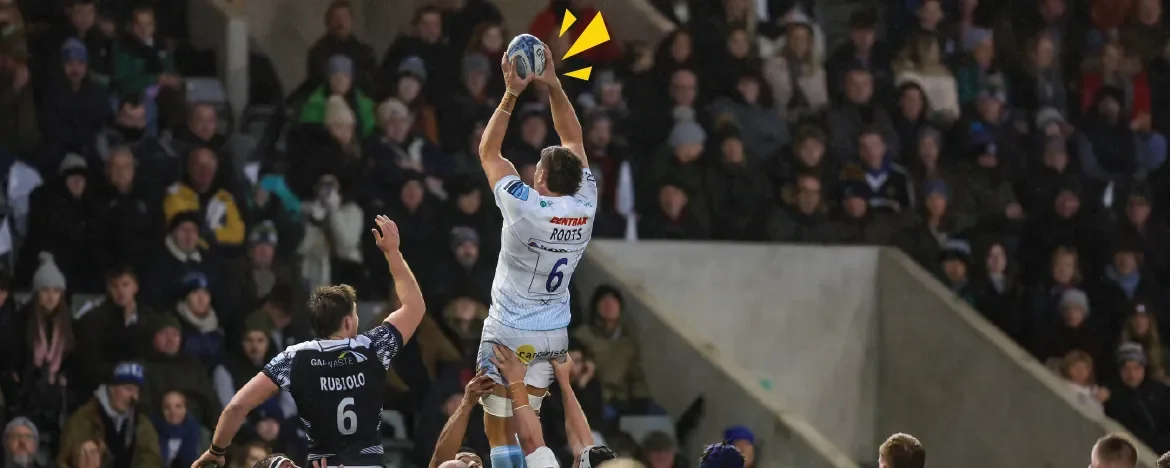 Man being lifted up in rugby line out