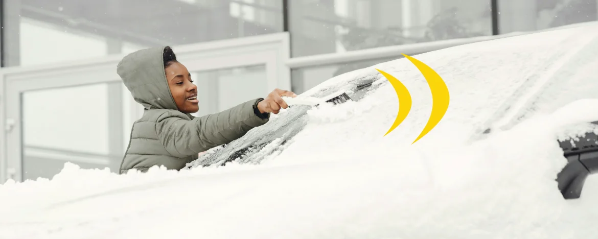 Person de-icing car