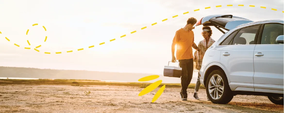 Picnic on the beach with a car