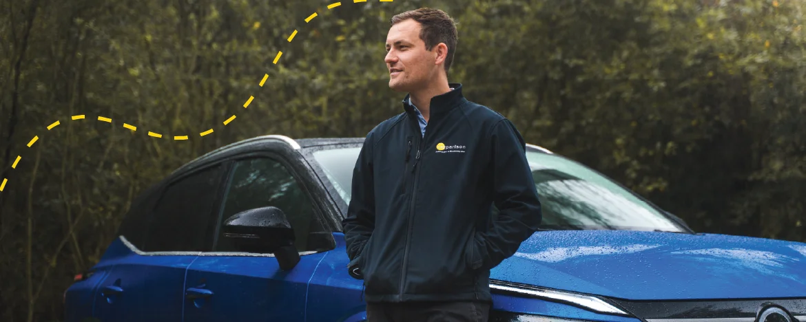 Man leaning against Nissan Qashqai