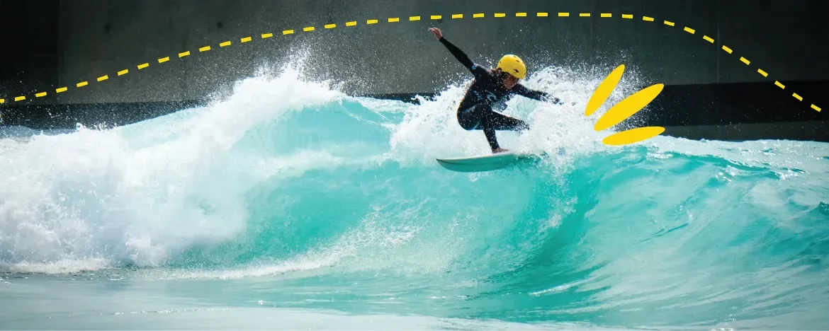 Young boy surfing at The Wave