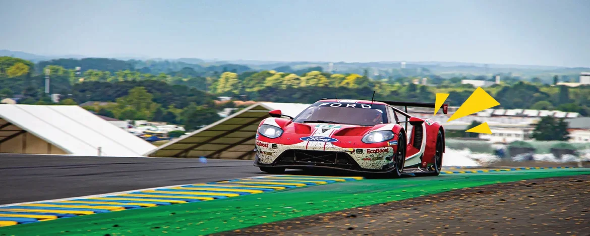 Ford driving on track