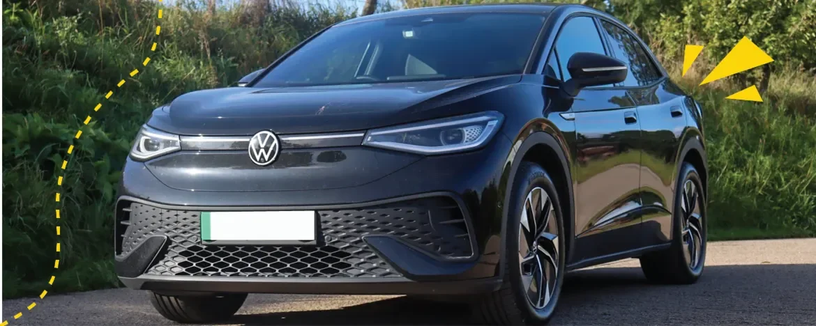 Volkswagen ID.5 parked in front of grass bank