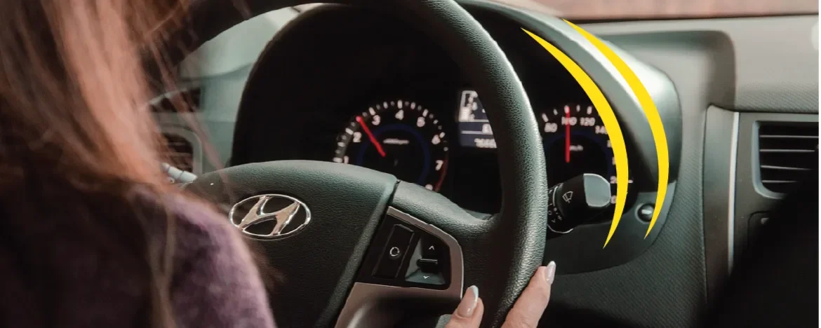 Person driving a car