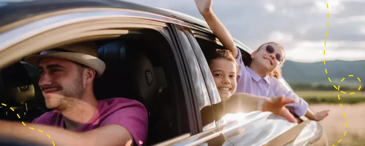 Happy family in their new car