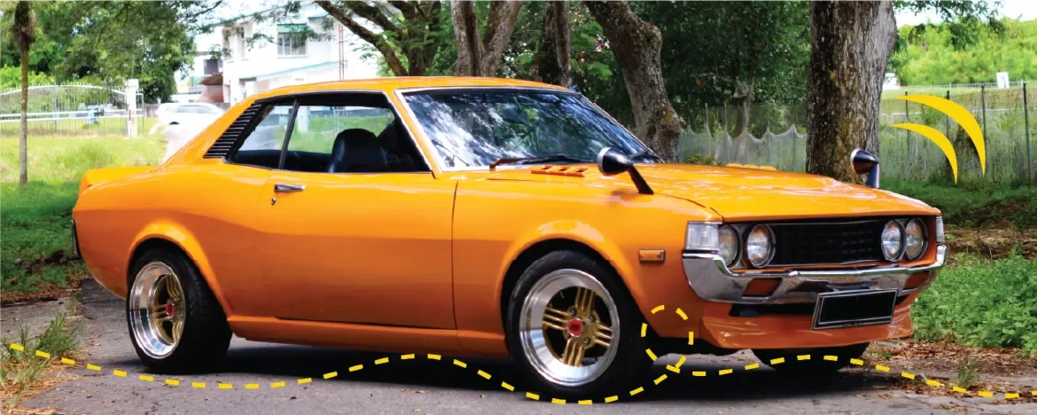 First-gen Toyota Celica with yellow accents