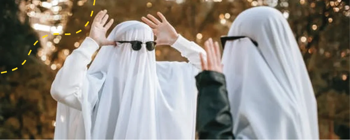 People dressed as ghosts