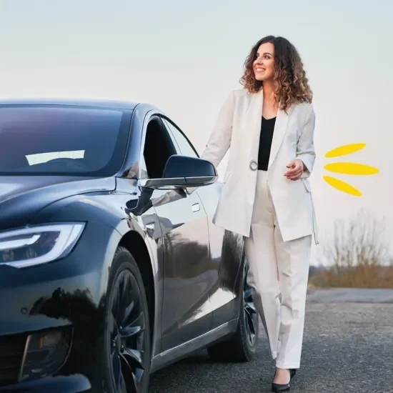 Business woman by car