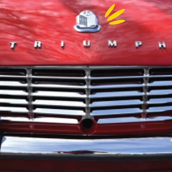 Classic Triumph car in red