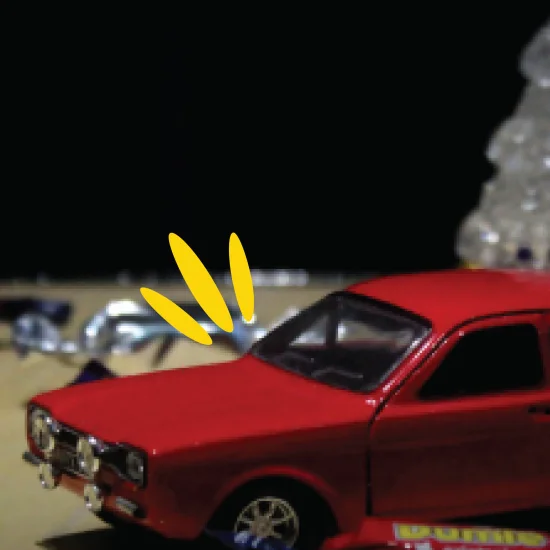 Car toy by christmas tree
