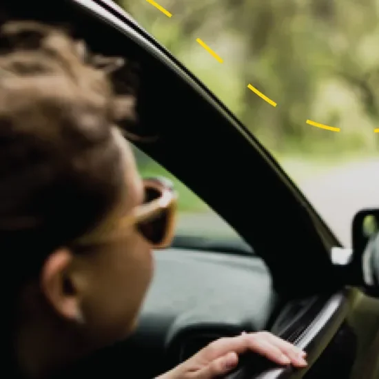 Person looking out of a car window