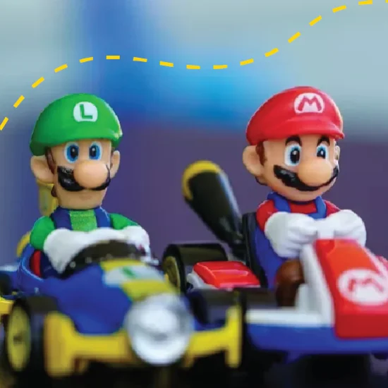Luigi and Mario figurines in go karts