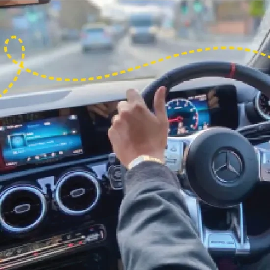 A person holding a Mercedes-Benz Wheel