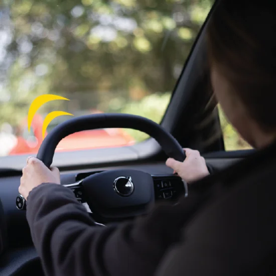 Woman driving Volvo