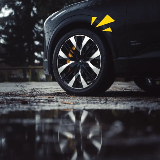 Polestar 3 wet tyre with reflection in puddle