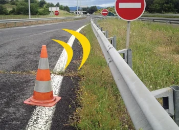 cone on road and no entry sign